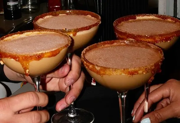 Espresso martinis raised for a toast
