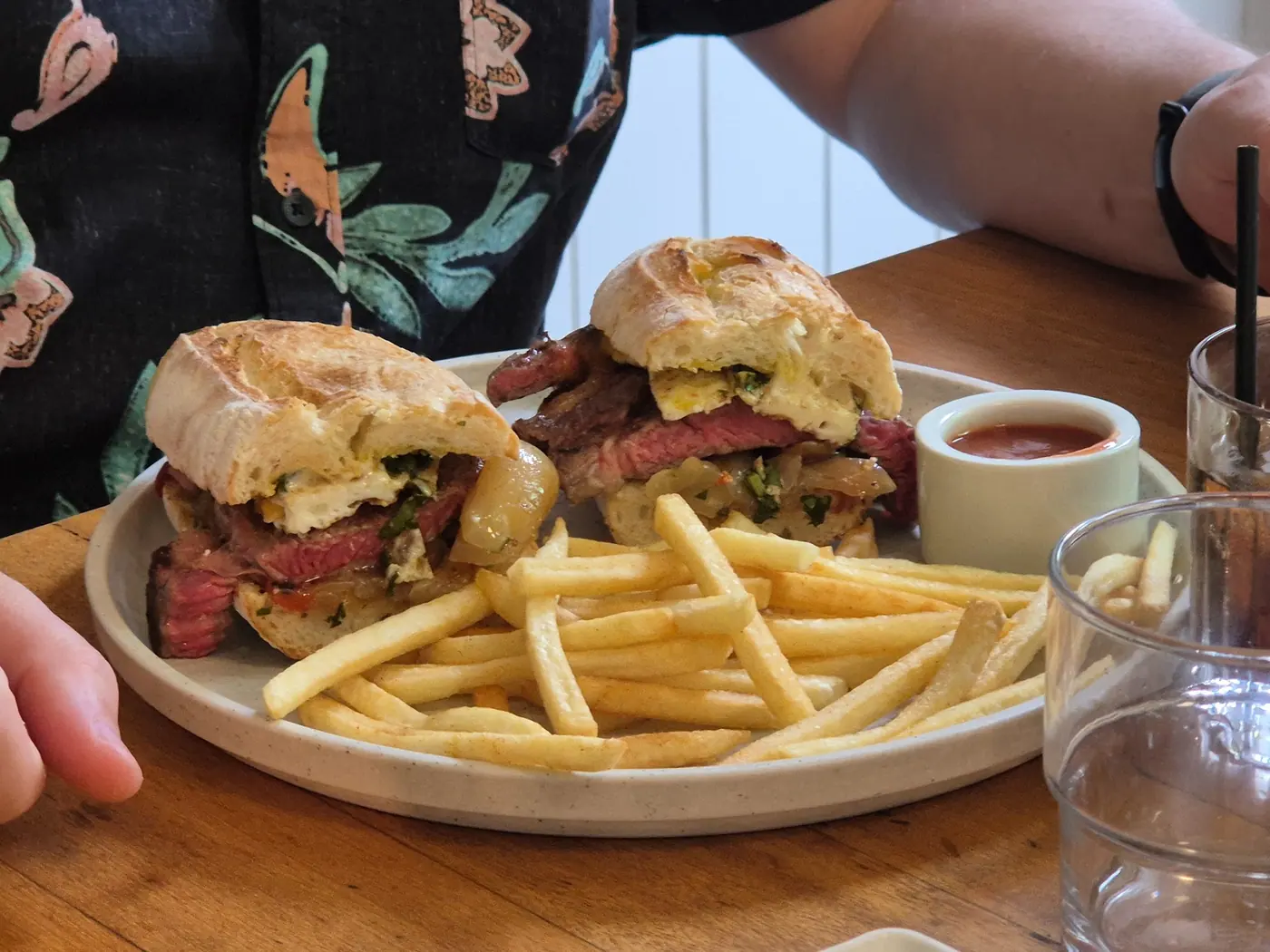 Quarter Two's signature steak rolls with fries